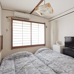 Kamer met Twee Aparte Bedden in Japanse Stijl